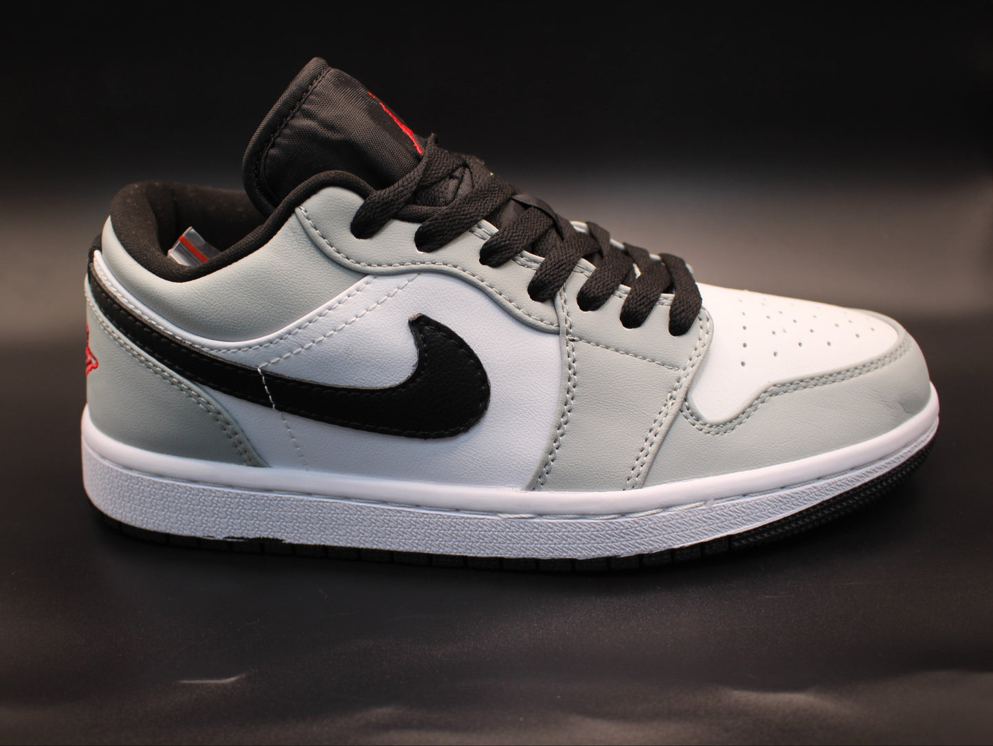 Jordan Women's 1 Low SE Sail/Seafoam Sneaker